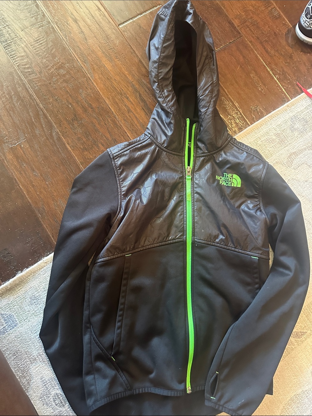 The North Face Black Jacket with Lime Green Zipper and Logo